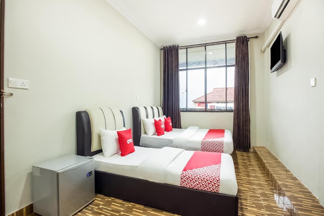 Oyo 89712 Grand Inn Semporna Zimmer foto